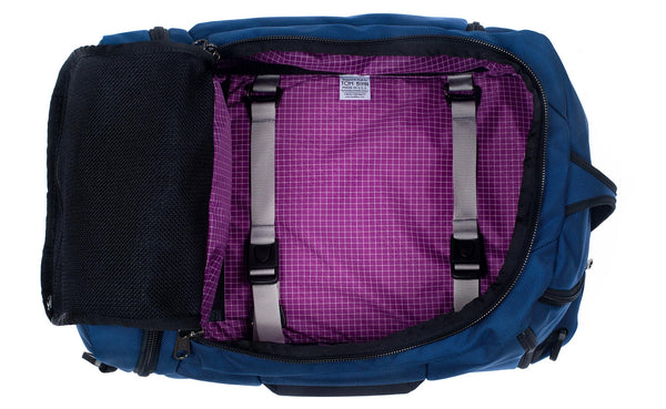 An open Techonaut 45 with a Navy exterior and an Ultraviolet (bright purple) interior.
